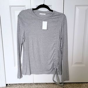 Long sleeve top with scrunched string on the side